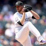 DENVER, COLORADO - JULY 21: Austin Gomber #26 of the Colorado Rockies throws against the Seattle Mariners in the first inning at Coors Field on July 21, 2021 in Denver, Colorado. (Photo by Matthew Stockman/Getty Images)