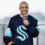 SEATTLE, WASHINGTON - JULY 21: Mark Giordano is selected by the Seattle Kraken during the 2021 NHL Expansion Draft at Gas Works Park on July 21, 2021 in Seattle, Washington. The Seattle Kraken is the National Hockey League's newest franchise and will begin play in October 2021. (Photo by Alika Jenner/Getty Images)
