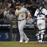 SEATTLE, WASHINGTON - JULY 22: Mitch Moreland #18 of the Oakland Athletics scores after Sean Murphy doubled to left field during the sixth inning of the game against the Seattle Mariners at T-Mobile Park on July 22, 2021 in Seattle, Washington. (Photo by Alika Jenner/Getty Images)