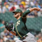 SEATTLE, WASHINGTON - JULY 25: Cole Irvin #19 of the Oakland Athletics throws a pitch during the first inning against the Seattle Mariners at T-Mobile Park on July 25, 2021 in Seattle, Washington. (Photo by Alika Jenner/Getty Images)