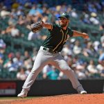 SEATTLE, WASHINGTON - JULY 25: Sam Moll #60 of the Oakland Athletics throws a pitch during the sixth inning of the game against the Seattle Mariners at T-Mobile Park on July 25, 2021 in Seattle, Washington. (Photo by Alika Jenner/Getty Images)