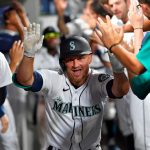 SEATTLE, WASHINGTON - JULY 26: Kyle Seager #15 of the Seattle Mariners celebrates with teammates after hitting a three run home run in the fifth inning of the game against the Houston Astros at T-Mobile Park on July 26, 2021 in Seattle, Washington. (Photo by Alika Jenner/Getty Images)