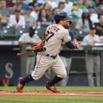 SEATTLE, WASHINGTON - JULY 27: Jose Altuve #27 of the Houston Astros hits a single in the first inning of the game against the Seattle Mariners at T-Mobile Park on July 27, 2021 in Seattle, Washington. (Photo by Alika Jenner/Getty Images)