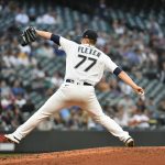 SEATTLE, WASHINGTON - JULY 27: Chris Flexen #77 of the Seattle Mariners throws a pitch during the fourth inning against the Houston Astros at T-Mobile Park on July 27, 2021 in Seattle, Washington. (Photo by Alika Jenner/Getty Images)