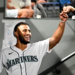 SEATTLE, WASHINGTON - JULY 27: Abraham Toro #13 of the Seattle Mariners smiles after hitting a two run home run in the ninth inning of the game against the Houston Astros at T-Mobile Park on July 27, 2021 in Seattle, Washington. The Astros won 8-6. (Photo by Alika Jenner/Getty Images)