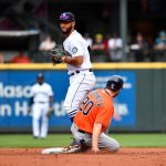 SEATTLE, WASHINGTON - JULY 28: Abraham Toro #13 of the Seattle Mariners can't turn make the throw to first base during the second inning of the game against the Houston Astros at T-Mobile Park on July 28, 2021 in Seattle, Washington. (Photo by Alika Jenner/Getty Images)