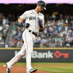 SEATTLE, WASHINGTON - JULY 24: Mitch Haniger #17 of the Seattle Mariners rounds the bases after hitting a home run in the third inning against the Oakland Athletics at T-Mobile Park on July 24, 2021 in Seattle, Washington. (Photo by Alika Jenner/Getty Images)
