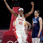 
              Spain's Astou Ndour (45) celebrates past Serbia's Jelena Brooks (9) during their win in a women's basketball game at the 2020 Summer Olympics, Thursday, July 29, 2021, in Saitama, Japan. (AP Photo/Eric Gay)
            