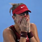 
              Belinda Bencic, of Switzerland, becomes emotional after defeating Elena Rybakina, of Kazakhstan, during the semifinals of the tennis competition at the 2020 Summer Olympics, Thursday, July 29, 2021, in Tokyo, Japan. (AP Photo/Seth Wenig)
            