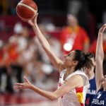 
              Spain's Alba Torrens drives to the basket past Serbia's Aleksandra Crvendakic, right, during a women's basketball preliminary round game at the 2020 Summer Olympics, Thursday, July 29, 2021, in Saitama, Japan. (AP Photo/Charlie Neibergall)
            