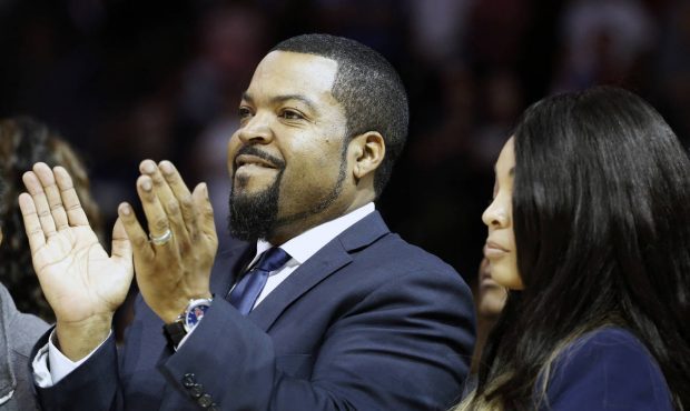 FILE - In this June 25, 2017, file photo, Big3 Basketball League founder Ice Cube applauds the crow...