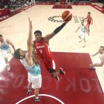 
              Japan' Rui Hachimura (8) drives to the basket against Slovenia's Mike Tobey (10) during a men's basketball preliminary round game at the 2020 Summer Olympics, Sunday, July 25, 2021, in Saitama, Japan. (Gregory Shamus/Pool Photo via AP)
            