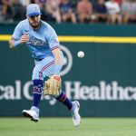 ARLINGTON, TX - AUGUST 1: David Dahl #21 of the Texas Rangers fields a single hit by J.P. Crawford #3 of the Seattle Mariners during the second inning at Globe Life Field on August 1, 2021 in Arlington, Texas. 
(Photo by Ron Jenkins/Getty Images)