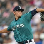SEATTLE, WA -  AUGUST 13: Chris Flexen #77 of the Seattle Mariners delivers a pitch during the first inning of a game against the Toronto Blue Jays at T-Mobile Park on August 13, 2021 in Seattle, Washington. (Photo by Stephen Brashear/Getty Images)
