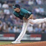 SEATTLE, WA -  AUGUST 13: Starter Chris Flexen #77 of the Seattle Mariners delivers a pitch during the third inning of a game against the Toronto Blue Jays at T-Mobile Park on August 13, 2021 in Seattle, Washington. (Photo by Stephen Brashear/Getty Images)