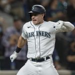 SEATTLE, WA -  AUGUST 14: Jarred Kelenic #10 of the Seattle Mariners celebrates after hitting a solo home run off of relief pitcher Trevor Richards #33 of the Toronto Blue Jays during the seventh inning of a tat T-Mobile Park on August 14, 2021 in Seattle, Washington. (Photo by Stephen Brashear/Getty Images)