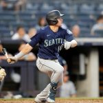 NEW YORK, NEW YORK - AUGUST 05:  Jarred Kelenic #10 of the Seattle Mariners follows through on a third inning base hit against the New York Yankees at Yankee Stadium on August 05, 2021 in New York City. (Photo by Jim McIsaac/Getty Images)