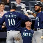 NEW YORK, NEW YORK - AUGUST 05:  Jarred Kelenic #10 of the Seattle Mariners celebrates his seventh inning home run against the New York Yankees with teammate J.P. Crawford #3 at Yankee Stadium on August 05, 2021 in New York City. (Photo by Jim McIsaac/Getty Images)