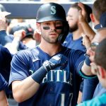 NEW YORK, NEW YORK - AUGUST 07:  Mitch Haniger #17 of the Seattle Mariners celebrates his second inning run scoring sacrifice fly against the New York Yankees with his teammates in the dugout at Yankee Stadium on August 07, 2021 in New York City. (Photo by Jim McIsaac/Getty Images)