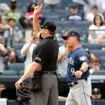 NEW YORK, NEW YORK - AUGUST 08:  Home plate umpire Lance Barrett throws Seattle Mariners manager Scott Servais #9 out outfield a game against the New York Yankees in the eighth inning at Yankee Stadium on August 08, 2021 in New York City. (Photo by Jim McIsaac/Getty Images)