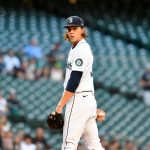 SEATTLE, WASHINGTON - AUGUST 10: Logan Gilbert #36 of the Seattle Mariners checks first base during the first inning of the game against the Texas Rangers at T-Mobile Park on August 10, 2021 in Seattle, Washington. (Photo by Alika Jenner/Getty Images)