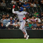 SEATTLE, WASHINGTON - AUGUST 10: Adolis Garcia #53 of the Texas Rangers gestures after hitting a home run in the ninth inning against the Seattle Mariners at T-Mobile Park on August 10, 2021 in Seattle, Washington. (Photo by Alika Jenner/Getty Images)