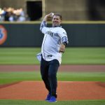 SEATTLE, WASHINGTON - AUGUST 11:  Former Seattle Mariners great Edgar Martinez throws the ceremonial first pitch before the game between the Mariners and the Texas Rangers at T-Mobile Park on August 11, 2021 in Seattle, Washington. (Photo by Alika Jenner/Getty Images)
