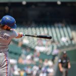 SEATTLE, WASHINGTON - AUGUST 12: Charlie Culberson #2 of the Texas Rangers hits a home run in the second inning against the Seattle Mariners at T-Mobile Park on August 12, 2021 in Seattle, Washington. (Photo by Alika Jenner/Getty Images)