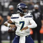 LAS VEGAS, NEVADA - AUGUST 14:  Quarterback Geno Smith #7 of the Seattle Seahawks looks to throw against the Las Vegas Raiders during a preseason game at Allegiant Stadium on August 14, 2021 in Las Vegas, Nevada. (Photo by Chris Unger/Getty Images)