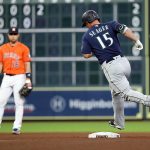 HOUSTON, TEXAS - AUGUST 20: Kyle Seager #15 of the Seattle Mariners rounds the bases after hitting a home run in the fourth inning against the Houston Astros at Minute Maid Park on August 20, 2021 in Houston, Texas. (Photo by Bob Levey/Getty Images)