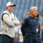 SEATTLE, WASHINGTON - AUGUST 21: Offensive coordinator Shane Waldron and head coach Pete Carroll of the Seattle Seahawks watch warm ups before an NFL preseason game against the Denver Broncos at Lumen Field on August 21, 2021 in Seattle, Washington. (Photo by Steph Chambers/Getty Images)