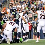 SEATTLE, WASHINGTON - AUGUST 21: Guard Dalton Risner #66 of the Denver Broncos reacts after his touchdown against the Seattle Seahawks in the first half during an NFL preseason game at Lumen Field on August 21, 2021 in Seattle, Washington. (Photo by Steph Chambers/Getty Images)