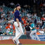 HOUSTON, TEXAS - AUGUST 22: Ryne Stanek #45 of the Houston Astros reacts after giving up a three-run home run to Kyle Seager #15 of the Seattle Mariners in the eleventh inning at Minute Maid Park on August 22, 2021 in Houston, Texas. (Photo by Bob Levey/Getty Images)