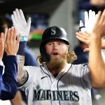 SEATTLE, WASHINGTON - AUGUST 26: Jake Fraley #28 of the Seattle Mariners celebrates his two-run home run to add to the 4-0 lead against the Kansas City Royals in the fifth inning at T-Mobile Park on August 26, 2021 in Seattle, Washington. (Photo by Abbie Parr/Getty Images)