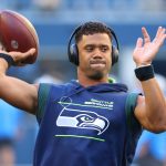 SEATTLE, WASHINGTON - AUGUST 28: Russell Wilson #3 of the Seattle Seahawks warms up before the NFL preseason game against the Los Angeles Chargers at Lumen Field on August 28, 2021 in Seattle, Washington. (Photo by Abbie Parr/Getty Images)