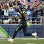 SEATTLE, WASHINGTON - AUGUST 28: Marquise Blair #27 of the Seattle Seahawks returned a 17 yard fumble for a touchdown against the Los Angeles Chargers in the first quarter during the NFL preseason game at Lumen Field on August 28, 2021 in Seattle, Washington. (Photo by Abbie Parr/Getty Images)
