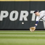 SEATTLE, WASHINGTON - AUGUST 31: Jake Bauers #5 of the Seattle Mariners catches the ball for an out in the fourth inning against the Houston Astros at T-Mobile Park on August 31, 2021 in Seattle, Washington. (Photo by Steph Chambers/Getty Images)