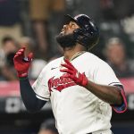 
              Cleveland Indians' Franmil Reyes looks up after hitting a solo home run during the seventh inning of the team's baseball game against the Texas Rangers, Wednesday, Aug. 25, 2021, in Cleveland. (AP Photo/Tony Dejak)
            