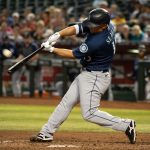 PHOENIX, AZ - SEPTEMBER 04: Kyle Seager #15 of the Seattle Mariners hits a three-run home run in the sixth inning of the MLB game against the Arizona Diamondbacks at Chase Field on September 4, 2021 in Phoenix, Arizona. (Photo by Kelsey Grant/Getty Images)