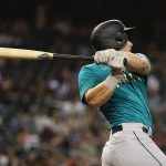 PHOENIX, ARIZONA - SEPTEMBER 03: Jarred Kelenic #10 of the Seattle Mariners hits a two-run home run against the Arizona Diamondbacks during the sixth inning of the MLB game at Chase Field on September 03, 2021 in Phoenix, Arizona. (Photo by Christian Petersen/Getty Images)