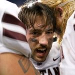 SEATTLE, WASHINGTON - SEPTEMBER 04: Camron Humphrey #2 of the Montana Grizzlies reacts with teammates after beating Washington Huskies 13-7 at Husky Stadium on September 04, 2021 in Seattle, Washington. (Photo by Steph Chambers/Getty Images)