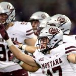 SEATTLE, WASHINGTON - SEPTEMBER 04: Robby Hauck #17 of the Montana Grizzlies celebrates with his teammates as time ticks down against the Washington Huskies at Husky Stadium on September 04, 2021 in Seattle, Washington. Montana Grizzlies beat Washington Huskies, 13-7. (Photo by Steph Chambers/Getty Images)