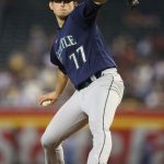 PHOENIX, ARIZONA - SEPTEMBER 05: Starting pitcher Chris Flexen #77 of the Seattle Mariners pitches against the Arizona Diamondbacks during the first inning of the MLB game at Chase Field on September 05, 2021 in Phoenix, Arizona. (Photo by Christian Petersen/Getty Images)
