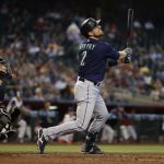 PHOENIX, ARIZONA - SEPTEMBER 05: Tom Murphy #2 of the Seattle Mariners hits a sacrifice fly during the fourth inning of the MLB game against the Arizona Diamondbacks at Chase Field on September 05, 2021 in Phoenix, Arizona. (Photo by Christian Petersen/Getty Images)