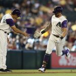 PHOENIX, ARIZONA - SEPTEMBER 05: David Peralta #6 of the Arizona Diamondbacks celebrates with Tony Perezchica #3 after hitting a two-run home run against the Seattle Mariners during the sixth inning of the MLB game at Chase Field on September 05, 2021 in Phoenix, Arizona. (Photo by Christian Petersen/Getty Images)