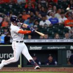 HOUSTON, TEXAS - SEPTEMBER 06: Alex Bregman #2 of the Houston Astros pops out in the first inning against the Seattle Mariners at Minute Maid Park on September 06, 2021 in Houston, Texas. (Photo by Bob Levey/Getty Images)