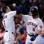 HOUSTON, TEXAS - SEPTEMBER 06: Jake Meyers #6 of the Houston Astros receives high five from Carlos Correa #1 after hitting a three run home run in the second inning against the Seattle Mariners at Minute Maid Park on September 06, 2021 in Houston, Texas. (Photo by Bob Levey/Getty Images)