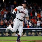 HOUSTON, TEXAS - SEPTEMBER 07: Alex Bregman #2 of the Houston Astros hits a two run home run in the ninth inning Mariners at Minute Maid Park on September 07, 2021 in Houston, Texas. (Photo by Bob Levey/Getty Images)