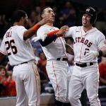 HOUSTON, TEXAS - SEPTEMBER 07: Alex Bregman #2 of the Houston Astros celebrates with Carlos Correa #1 and Jose Siri #26 after hitting a two run home run in the ninth inning to tie the game Mariners at Minute Maid Park on September 07, 2021 in Houston, Texas. (Photo by Bob Levey/Getty Images)
