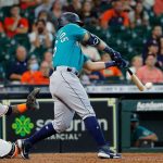HOUSTON, TEXAS - SEPTEMBER 08: Jose Marmolejos #26 of the Seattle Mariners singles in two runs the ninth inning against the Houston Astros at Minute Maid Park on September 08, 2021 in Houston, Texas. (Photo by Bob Levey/Getty Images)
